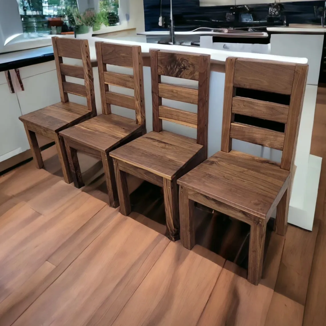 Set of matching solid wood dining chairs around a custom table
