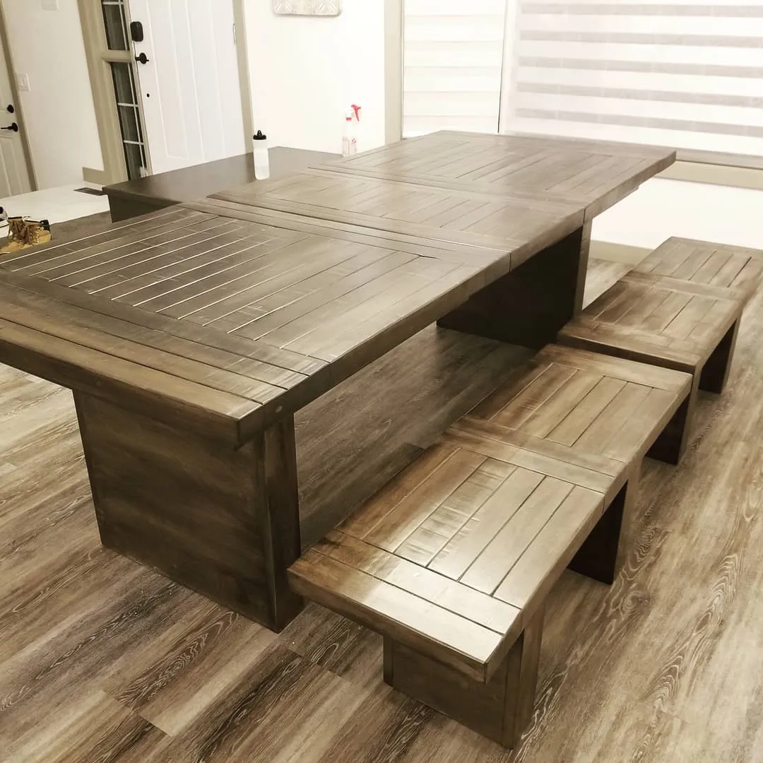 Dining table with two matching benches tucked underneath