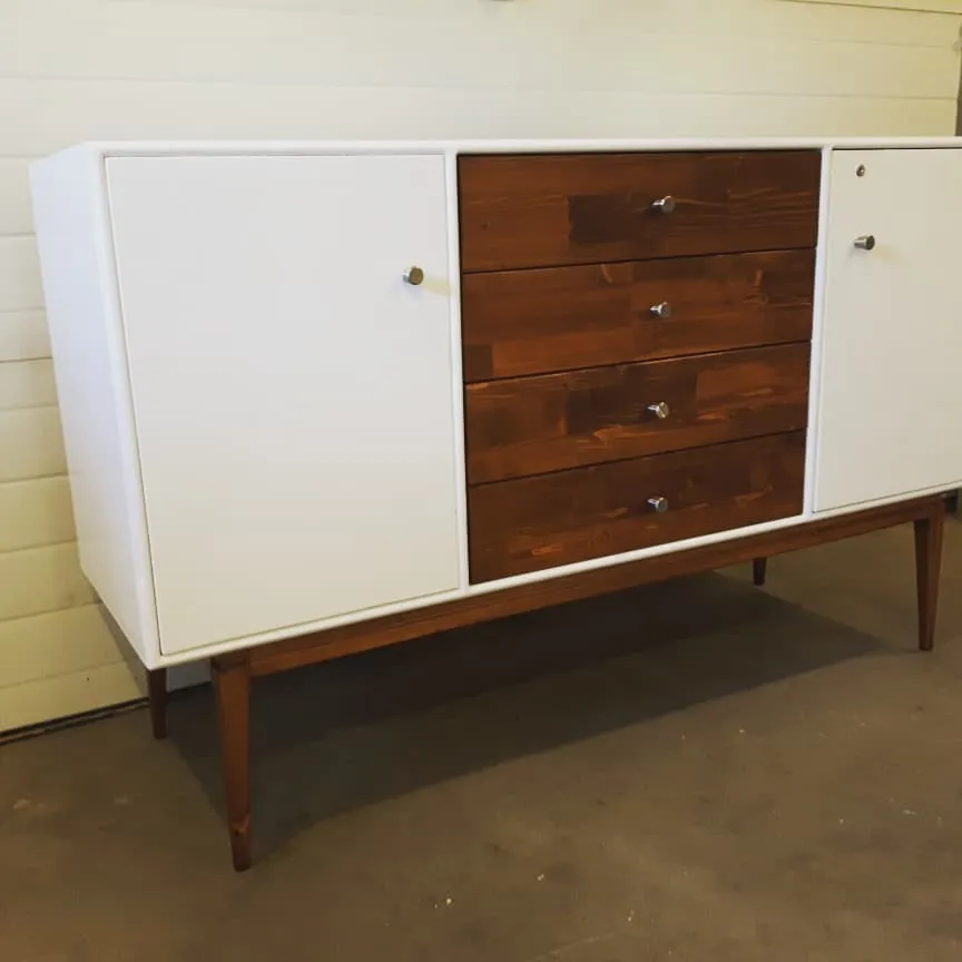 Solid wood dresser with a row of matching drawers