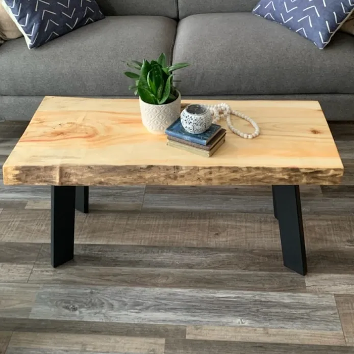 Live edge coffee table with a steel base